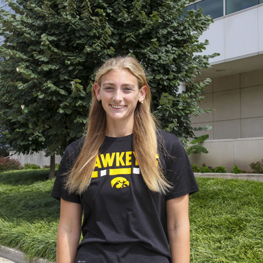Nina Osborne poses for a photo on the T. Anne Cleary walkway, contributed by Osborne. Osborne is a third-year honors peer mentor double-majoring in geography and environmental planning. 