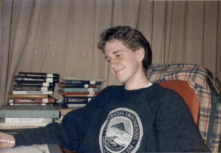 A college-aged Shaun Vecera surrounds himself with many books, reads, and hangs out with his future spouse, Maureen, in these vintage photos. Courtesy of Maureen Vecera.