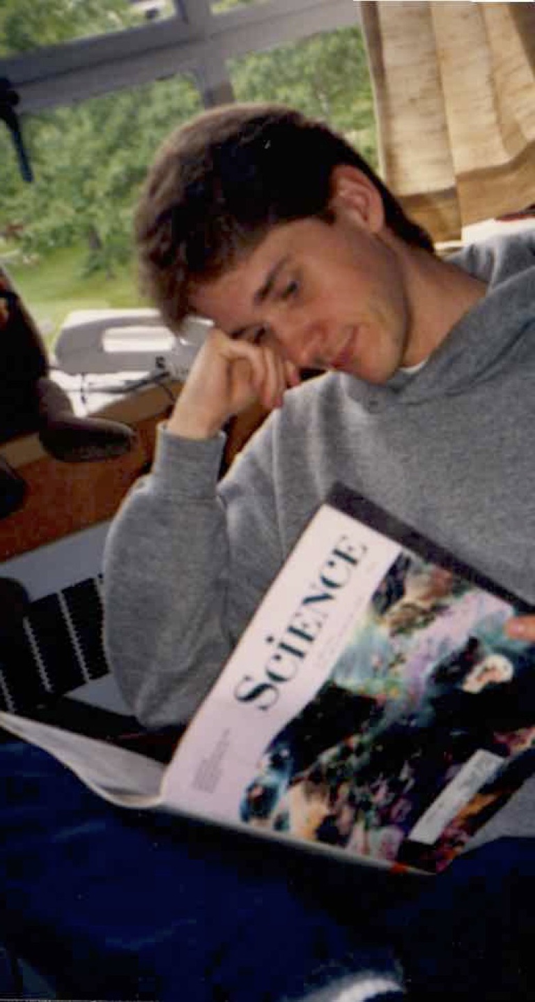 A college-aged Shaun Vecera surrounds himself with many books, reads, and hangs out with his future spouse, Maureen, in these vintage photos. Courtesy of Maureen Vecera.